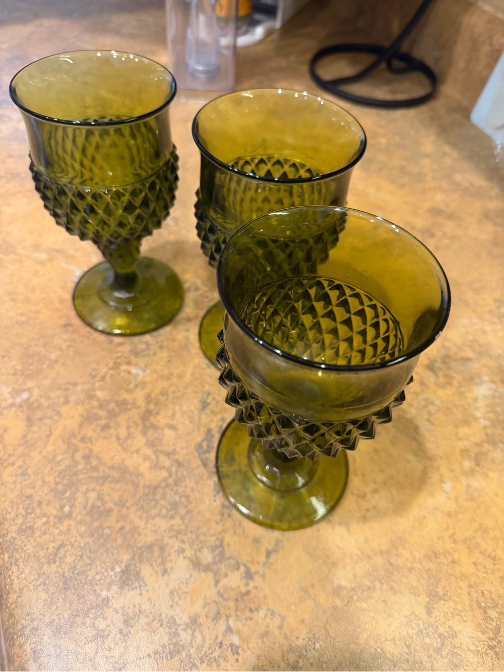 Vintage Indiana Glass avocado green Diamond Point stemmed goblets.